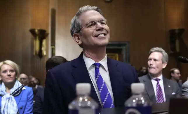 Scott Bessent, President-elect Donald Trump's choice to be Secretary of the Treasury, appears before the Senate Finance Committee for his confirmation hearing, at the Capitol in Washington, Thursday, Jan. 16, 2025. (AP Photo/Ben Curtis)