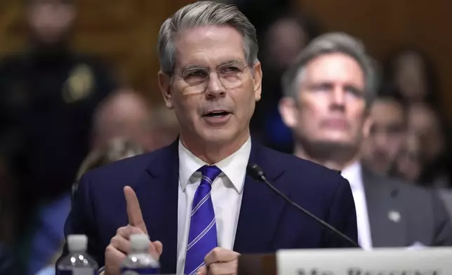 Scott Bessent, President-elect Donald Trump's choice to be Secretary of the Treasury, appears before the Senate Finance Committee for his confirmation hearing, at the Capitol in Washington, Thursday, Jan. 16, 2025. (AP Photo/Ben Curtis)
