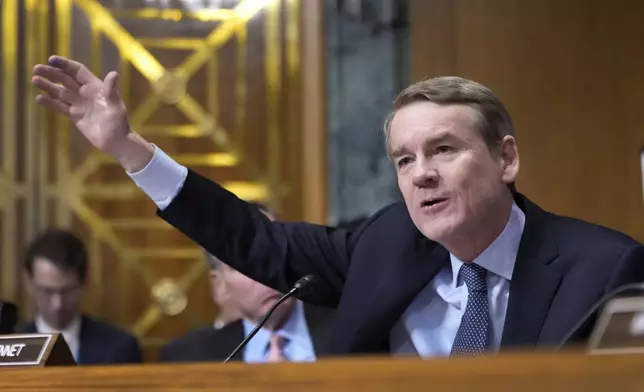 Sen. Michael Bennet, D-Colo.,speaks at the Senate Finance Committee confirmation hearing for Scott Bessent, President-elect Donald Trump's choice to be Secretary of the Treasury, at the Capitol in Washington, Thursday, Jan. 16, 2025. (AP Photo/Ben Curtis)