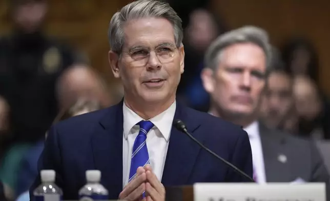 Scott Bessent, President-elect Donald Trump's choice to be Secretary of the Treasury, appears before the Senate Finance Committee for his confirmation hearing, at the Capitol in Washington, Thursday, Jan. 16, 2025. (AP Photo/Ben Curtis)