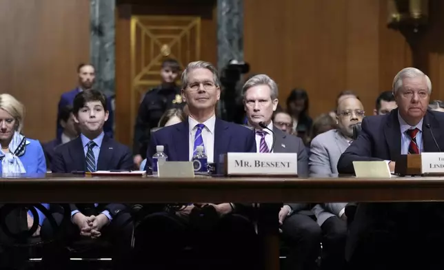 Scott Bessent, President-elect Donald Trump's choice to be Secretary of the Treasury, appears before the Senate Finance Committee for his confirmation hearing, at the Capitol in Washington, Thursday, Jan. 16, 2025. (AP Photo/Ben Curtis)