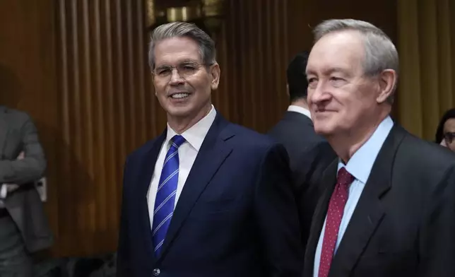 Scott Bessent, President-elect Donald Trump's choice to be Secretary of the Treasury, arrives before the Senate Finance Committee for his confirmation hearing, at the Capitol in Washington, Thursday, Jan. 16, 2025. (AP Photo/Ben Curtis)