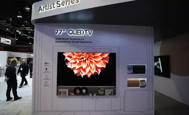 A 77'' OLED TV is pictured at a LG Electronics booth during the CES tech show Tuesday, Jan. 7, 2025, in Las Vegas. (AP Photo/Abbie Parr)