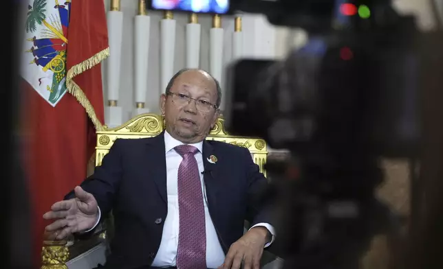 Leslie Voltaire, the president of Haiti's Transition Council, talks during an interview with the Associated Press in Rome, Saturday, Jan. 25, 2025. (AP Photo/Alessandra Tarantino)