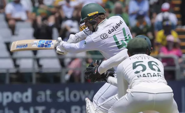 South Africa's Ryan Rickelton in action during the second day of the second test match between South Africa and Pakistan in Cape Town, South Africa, Saturday, Jan. 4, 2025. (AP Photo/Halden Krog)