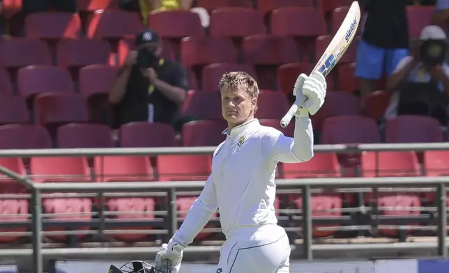 South Africa's Ryan Rickelton thanks the crowd after his 259 run innings during the second day of the second test match between South Africa and Pakistan in Cape Town, South Africa, Saturday, Jan. 4, 2025. (AP Photo/Halden Krog)