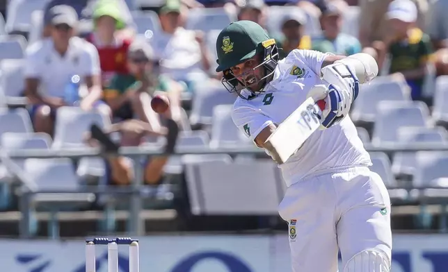 South Africa's Keshav Maharaj in action during the second day of the second test match between South Africa and Pakistan in Cape Town, South Africa, Saturday, Jan. 4, 2025. (AP Photo/Halden Krog)