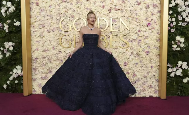 Kate Hudson arrives at the 82nd Golden Globes on Sunday, Jan. 5, 2025, at the Beverly Hilton in Beverly Hills, Calif. (Photo by Jordan Strauss/Invision/AP)