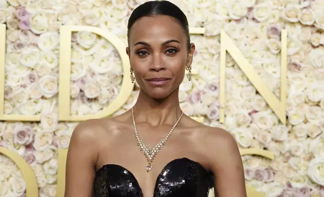 Zoe Saldana arrives at the 82nd Golden Globes on Sunday, Jan. 5, 2025, at the Beverly Hilton in Beverly Hills, Calif. (Photo by Jordan Strauss/Invision/AP)