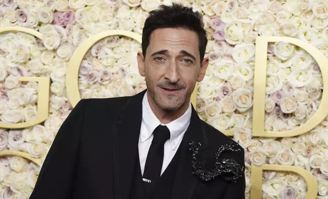 Adrien Brody arrives at the 82nd Golden Globes on Sunday, Jan. 5, 2025, at the Beverly Hilton in Beverly Hills, Calif. (Photo by Jordan Strauss/Invision/AP)