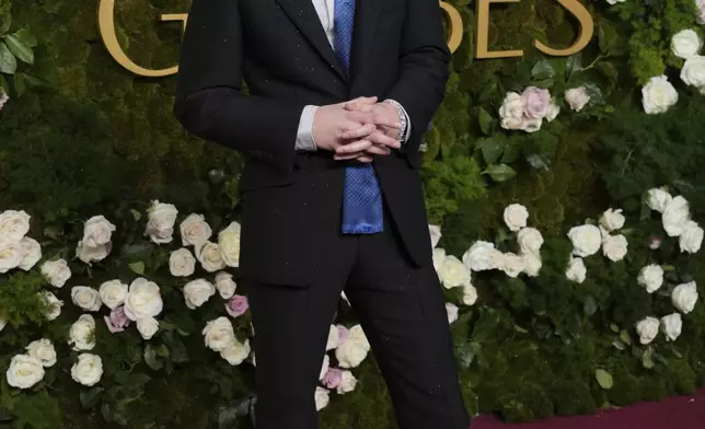 Timothee Chalamet arrives at the 82nd Golden Globes on Sunday, Jan. 5, 2025, at the Beverly Hilton in Beverly Hills, Calif. (Photo by Jordan Strauss/Invision/AP)