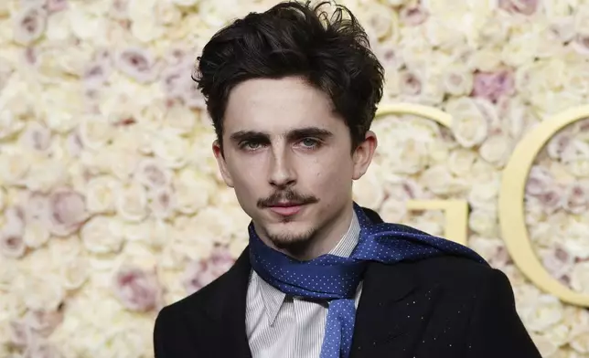 Timothee Chalamet arrives at the 82nd Golden Globes on Sunday, Jan. 5, 2025, at the Beverly Hilton in Beverly Hills, Calif. (Photo by Jordan Strauss/Invision/AP)