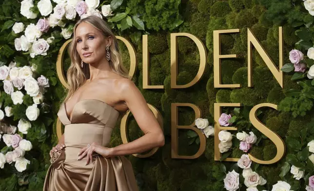 Nikki Glaser arrives at the 82nd Golden Globes on Sunday, Jan. 5, 2025, at the Beverly Hilton in Beverly Hills, Calif. (Photo by Jordan Strauss/Invision/AP)