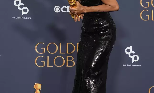 Zoe Saldana poses in the press room with the award for best performance by a female actor in a supporting role in any motion picture for "Emilia Perez" during the 82nd Golden Globes on Sunday, Jan. 5, 2025, at the Beverly Hilton in Beverly Hills, Calif. (AP Photo/Chris Pizzello)