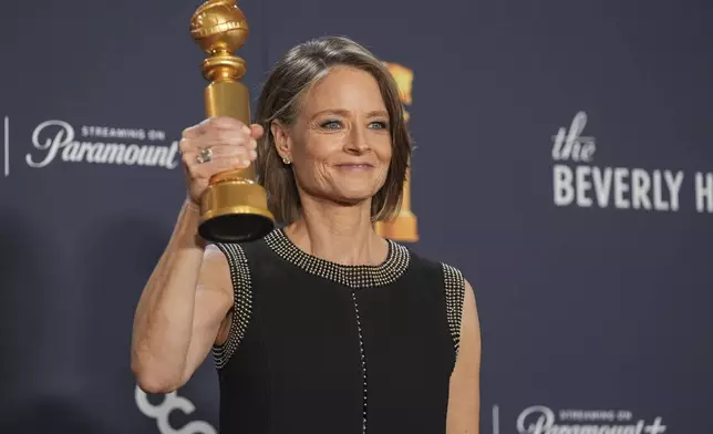 Jodie Foster poses in the press room with the award for best performance by a female actor in a limited series, anthology series, or a motion picture made for television for "True Detective: Night Country" during the 82nd Golden Globes on Sunday, Jan. 5, 2025, at the Beverly Hilton in Beverly Hills, Calif. (AP Photo/Chris Pizzello)