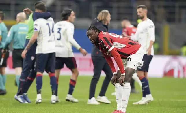 AC Milan's Tammy Abraham reacts at the end of the Serie A soccer match between AC Milan and Cagliari at the San Siro stadium, in Milan, Italy, Saturday, Jan. 11, 2025. (AP Photo/Antonio Calanni)