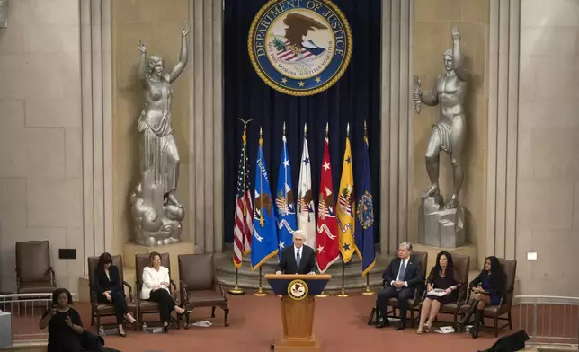 Attorney General Merrick Garland speaks during a farewell ceremony at the Department of Justice, Thursday, Jan. 16, 2025, in Washington. (AP Photo/Mark Schiefelbein)