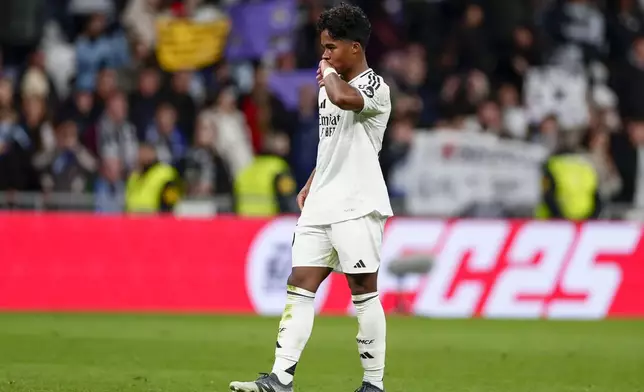 Real Madrid's Endrick celebrates after scoring his side's 5th goal against Celta de Vigo during a Copa del Rey round of 16 soccer match at the Santiago Bernabeu stadium in Madrid, Spain, Friday, Jan. 17, 2025. (AP Photo/Pablo Garcia)