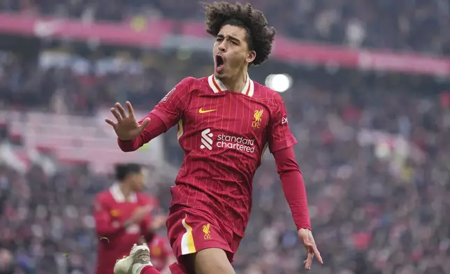 Liverpool's Jayden Danns celebrates after scoring his side's third goal during the FA Cup soccer match between Liverpool and Accrington Stanley at the Anfield stadium in Liverpool, England, Saturday, Jan. 11, 2025. (AP Photo/Jon Super)