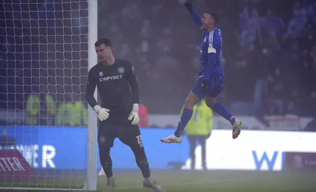 Leicester City's Jamie Vardy celebrates scoring his side's fourth goal, during the English FA Cup third round soccer match between Leicester City and Queen Parks Rangers at the King Power Stadium, in Leicester, England, Saturday, Jan. 11, 2025. (Mike Egerton/PA via AP)