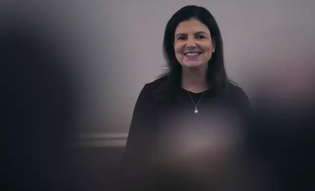 Republican Kelly Ayotte, a former U.S. senator who succeeds fellow Republican Chris Sununu, smiles while addressing the House Chamber during her inauguration at the State House, Thursday, Jan. 9, 2025, in Concord, N.H. (AP Photo/Charles Krupa)