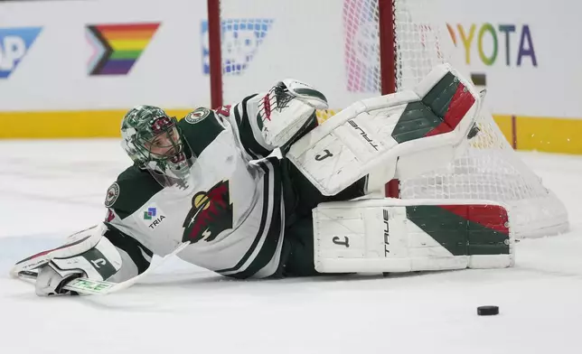 Minnesota Wild goaltender Marc-Andre Fleury defends against a shot by the San Jose Sharks during the first period of an NHL hockey game in San Jose, Calif., Saturday, Jan. 11, 2025. (AP Photo/Jeff Chiu)