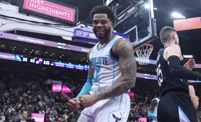 Charlotte Hornets forward Miles Bridges reacts to a play against the Utah Jazz during the second quarter of an NBA basketball game, Wednesday, Jan. 15, 2025, in Salt Lake City. (AP Photo/Rob Gray)