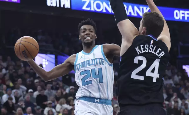 Charlotte Hornets forward Brandon Miller (24) goes to the basket against Utah Jazz center Walker Kessler (24) during the second quarter of an NBA basketball game, Wednesday, Jan. 15, 2025, in Salt Lake City. (AP Photo/Rob Gray)