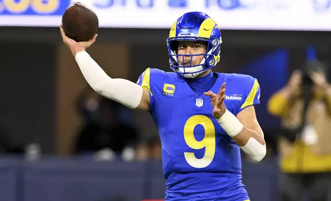 Los Angeles Rams quarterback Matthew Stafford (9) throw a pass during the first half of an NFL football game against the Arizona Cardinals, Saturday, Dec. 28, 2024, in Inglewood, Calif. (AP Photo/Alex Gallardo)