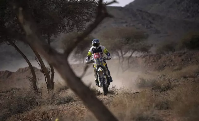 Jerome Martiny of Belgium rides during the fifth stage of the Dakar Rally between Alula and Hail, Saudi Arabia, Thursday, Jan. 9, 2025. (AP Photo/Christophe Ena)