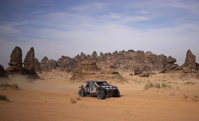 Daccia driver Nasser Al-Attiyah and co-driver Edouard Boulanger compete during the fifth stage of the Dakar Rally between Alula and Hail, Saudi Arabia, Thursday, Jan. 9, 2025. (AP Photo/Christophe Ena)