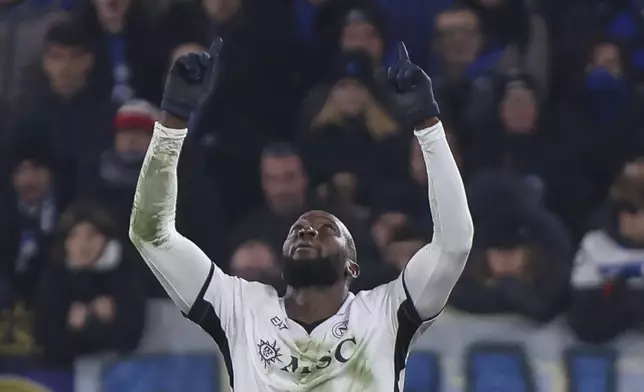 Napoli's Romelu Lukaku celebrates after scoring goal during an Italian Serie A soccer match between Atalanta and Napoli at the Gewiss Stadium in Bergamo, Italy, Saturday, Jan. 18, 2025. (Stefano Nicoli/LaPresse via AP)