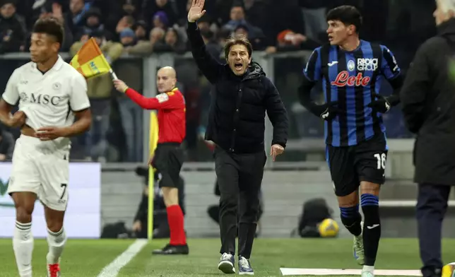 Napoli's head coach Antonio Conte reacts during the Italian Serie A soccer match between Atalanta and Napoli at the Gewiss Stadium in Bergamo, Italy, Saturday, Jan. 18, 2025. (Stefano Nicoli/LaPresse via AP)