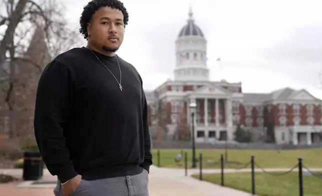 Student Kenny Douglas poses for a photo at the University of Missouri where he is a a history and Black studies major, Wednesday, Dec. 18, 2024, in Columbia, Mo. (AP Photo/Jeff Roberson)