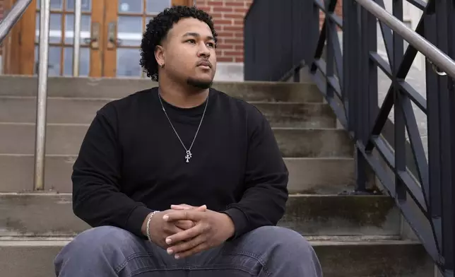 Student Kenny Douglas poses for a photo at the University of Missouri where he is a a history and Black studies major, Wednesday, Dec. 18, 2024, in Columbia, Mo. (AP Photo/Jeff Roberson)