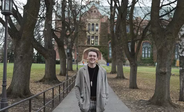 Nick Koenig, a University of Idaho doctoral student who teaches in climate change and sociology, poses for a photo on Thursday, Dec. 12, 2024, on campus in Moscow, Idaho. (AP Photo/Ted S. Warren)