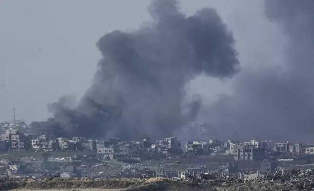 Smoke rises following an explosion in the Gaza Strip, as seen from southern Israel, Thursday, Jan. 9, 2025. (AP Photo/Mahmoud Illean)