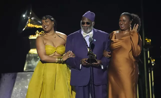 Taj Mahal of The Taj Mahal Sextet accepts the award for best traditional blues album for "Swingin' Live at The Church in Tulsa" during the 67th annual Grammy Awards on Sunday, Feb. 2, 2025, in Los Angeles. (AP Photo/Chris Pizzello)