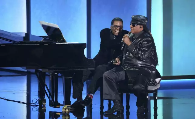 Herbie Hancock, left, and Stevie Wonder perform during the 67th annual Grammy Awards on Sunday, Feb. 2, 2025, in Los Angeles. (AP Photo/Chris Pizzello)