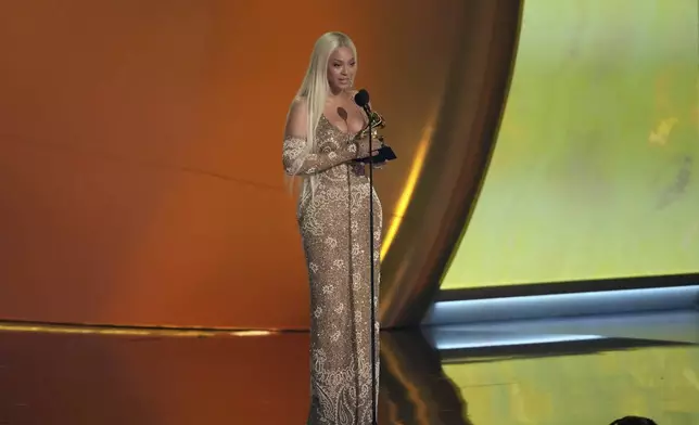 Beyonce accepts the award for best country album for "COWBOY CARTER" during the 67th annual Grammy Awards on Sunday, Feb. 2, 2025, in Los Angeles. (AP Photo/Chris Pizzello)