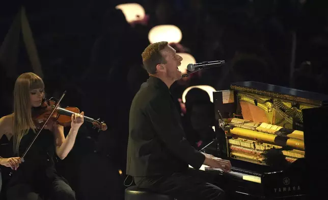 Chris Martin performs "All My Love" for the In Memoriam segment during the 67th annual Grammy Awards on Sunday, Feb. 2, 2025, in Los Angeles. (AP Photo/Chris Pizzello)