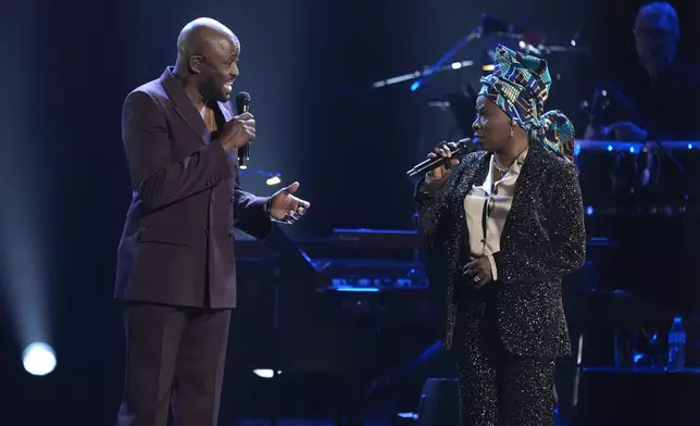 Wayne Brady, left, and Angelique Kidjo perform "Bridge Over Trouble Water" during the 67th annual Grammy Awards on Sunday, Feb. 2, 2025, in Los Angeles. (AP Photo/Chris Pizzello)