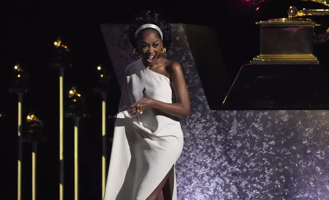 Muni Long accepts the award for best r&amp;b performance for "Made For Me (Live On BET)" during the 67th annual Grammy Awards on Sunday, Feb. 2, 2025, in Los Angeles. (AP Photo/Chris Pizzello)