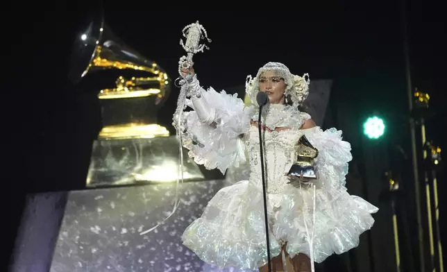 Sierra Ferrell accepts the award for best american roots performance for "Lighthouse" during the 67th annual Grammy Awards on Sunday, Feb. 2, 2025, in Los Angeles. (AP Photo/Chris Pizzello)