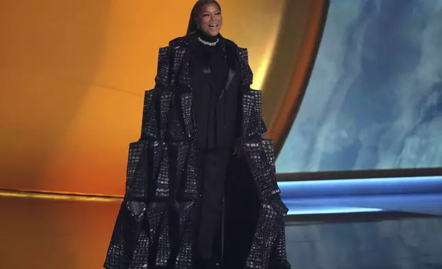 Queen Latifah presents the Dr. Dre Global Impact Award during the 67th annual Grammy Awards on Sunday, Feb. 2, 2025, in Los Angeles. (AP Photo/Chris Pizzello)