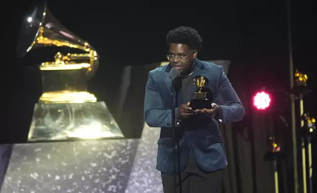 Marc Bridges accepts the award for best melodic rap performance for Rapsody's 3:AM" during the 67th annual Grammy Awards on Sunday, Feb. 2, 2025, in Los Angeles. (AP Photo/Chris Pizzello)