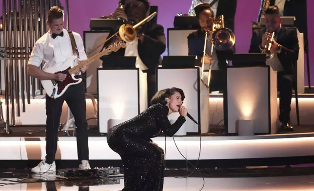 Raye performs "Oscar Winning Tears" during the 67th annual Grammy Awards on Sunday, Feb. 2, 2025, in Los Angeles. (AP Photo/Chris Pizzello)