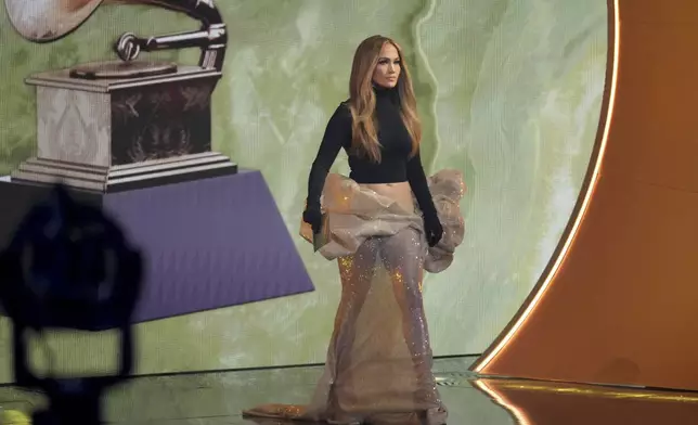 Jennifer Lopez presents the award for best latin pop album during the 67th annual Grammy Awards on Sunday, Feb. 2, 2025, in Los Angeles. (AP Photo/Chris Pizzello)
