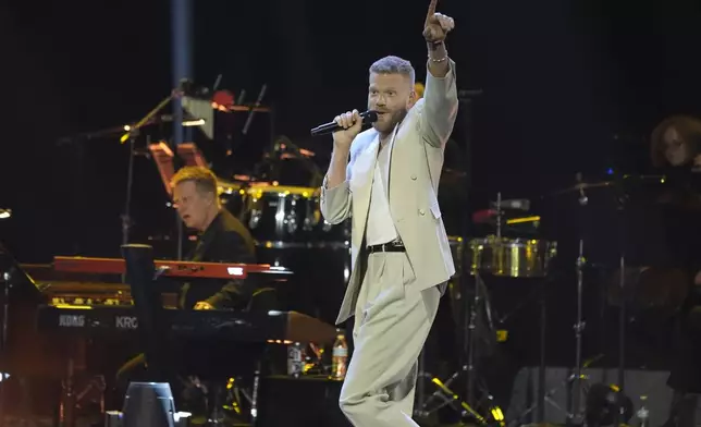Scott Hoying performs "Bridge Over Troubled Water" during the 67th annual Grammy Awards on Sunday, Feb. 2, 2025, in Los Angeles. (AP Photo/Chris Pizzello)