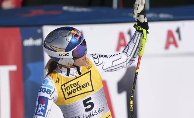 Czech Republic's Ester Ledecka celebrates at the finish area of a women's downhill race, at the Alpine Ski World Championships, in Saalbach-Hinterglemm, Austria, Saturday, Feb. 8, 2025. (AP Photo/Giovanni Auletta)
